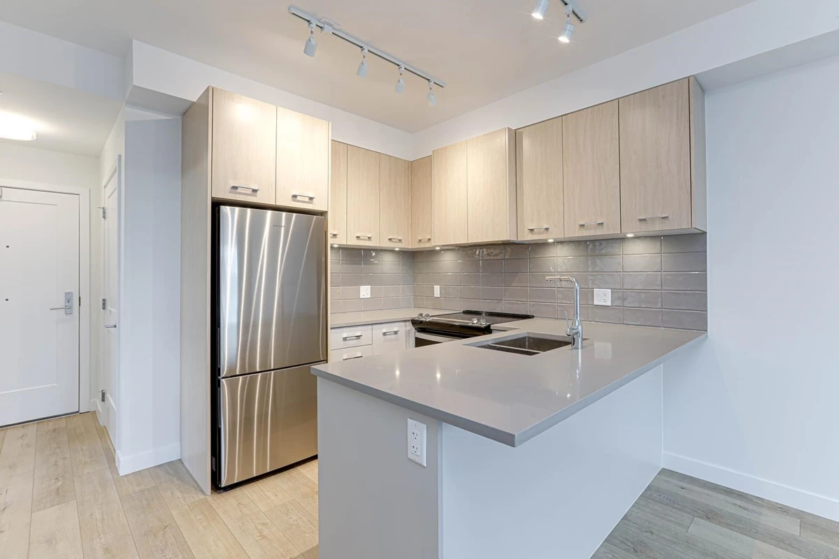 Living Room Photo of 206 4933 Clarendon Street, Vancouver, BC