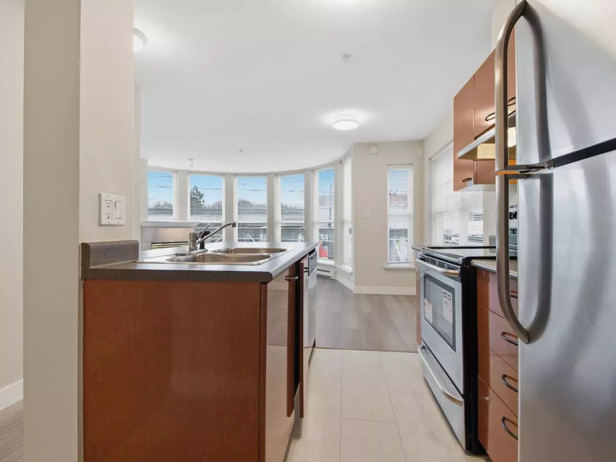 Living Room Photo of 206 1688 E 8th Avenue, Vancouver, BC