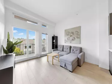 Living Room Photo of 408 13931 Fraser Highway, Surrey, BC