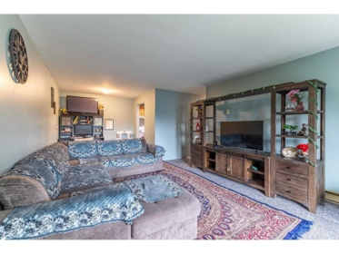 Living Room Photo of 105 33850 Fern Street Street, Abbotsford, BC