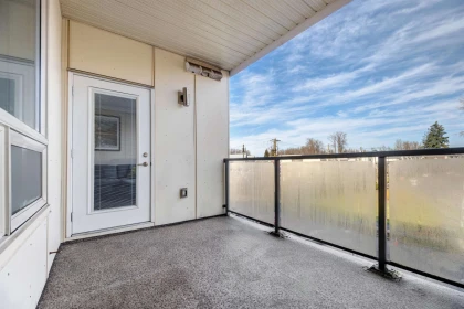 Laundry Room Photo of 408 19228 64 Avenue, Surrey, BC