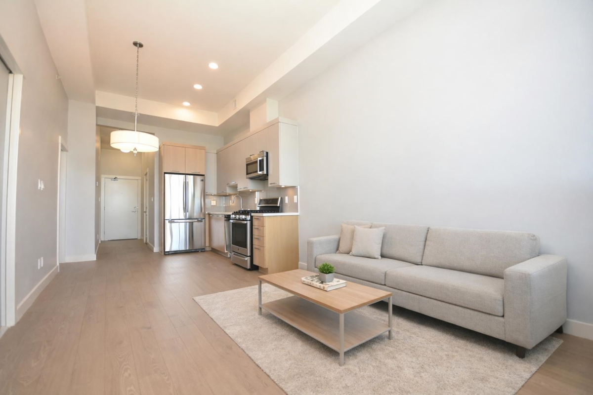 Living Room Photo of 406 4977 Springs Boulevard, Delta, BC