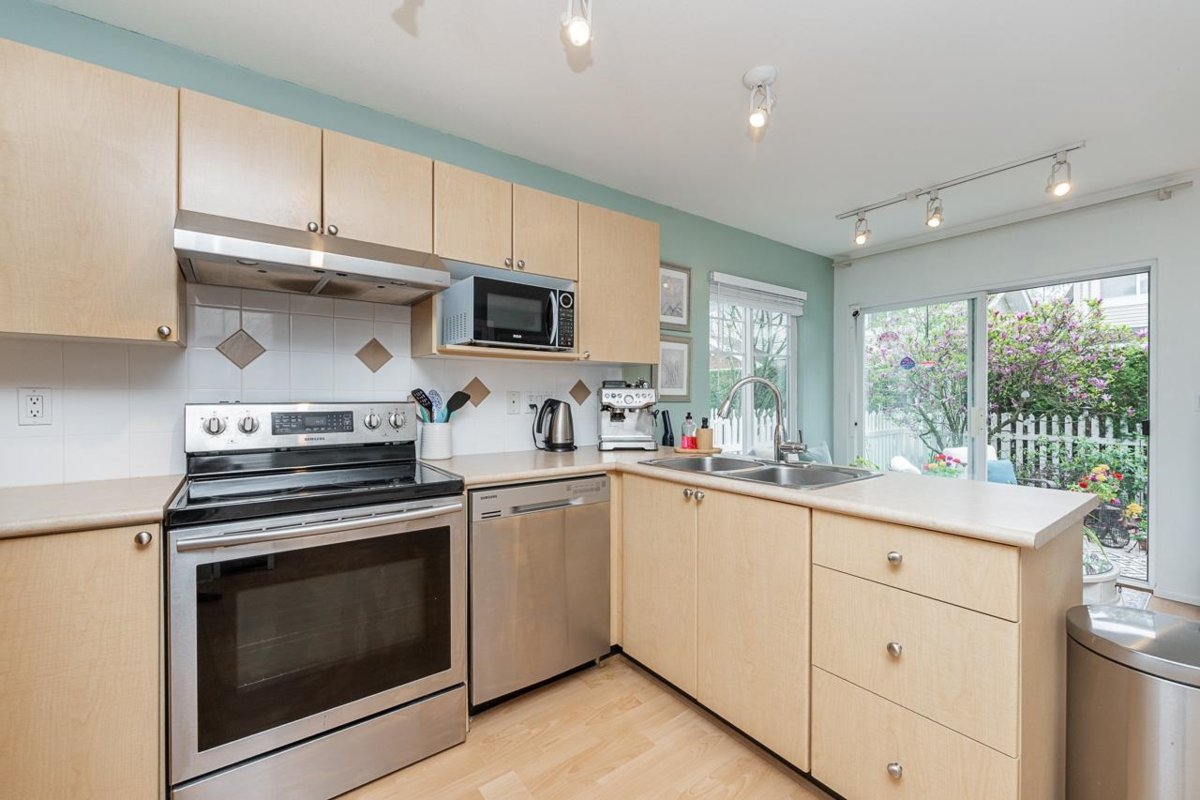 Family Room Photo of 53 12110 75a Avenue, Surrey, BC