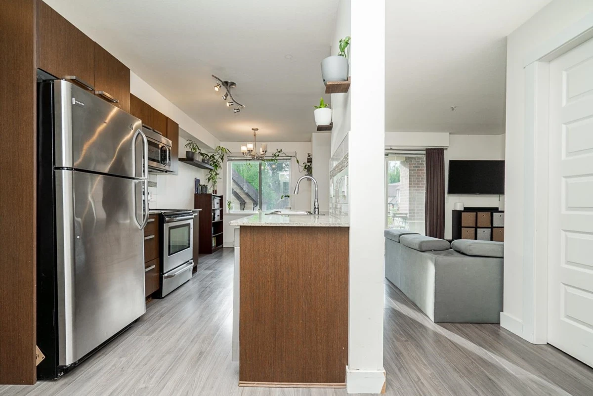 Living Room Photo of 313 13883 Laurel Drive, Surrey, BC