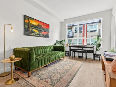 Living Room Photo of 421 13238 105 Avenue, Surrey, BC