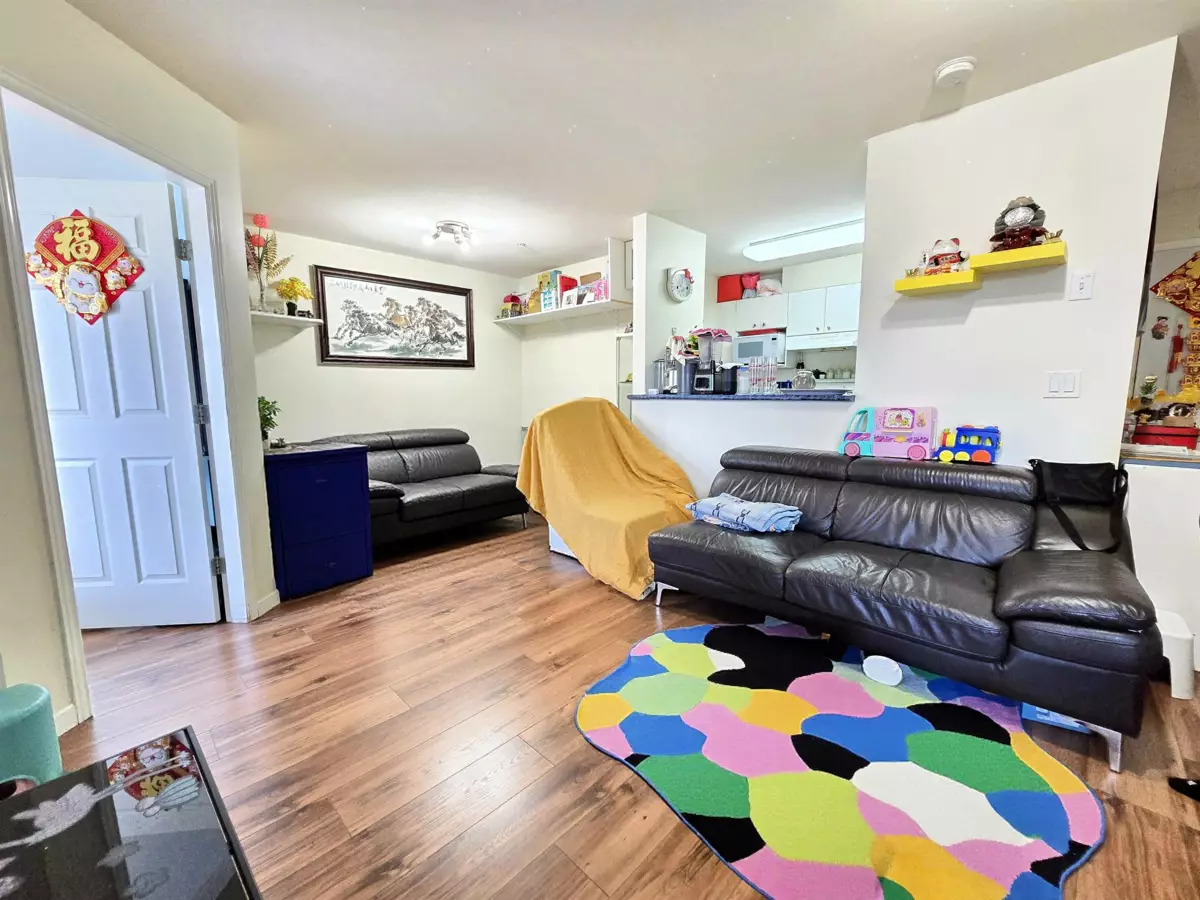 Living Room Photo of 406 1145 Heffley Crescent, Coquitlam, BC