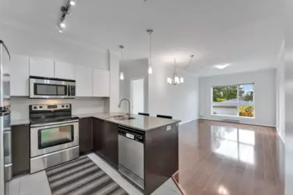Living Room Photo of 335 13733 107a Avenue, Surrey, BC