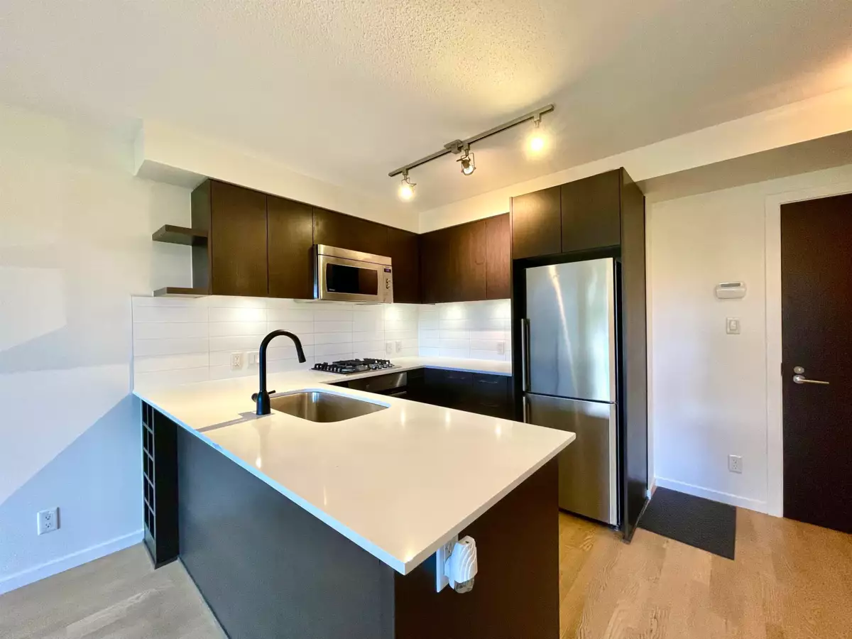 Family Room Photo of 707 7733 Firbridge Way, Richmond, BC