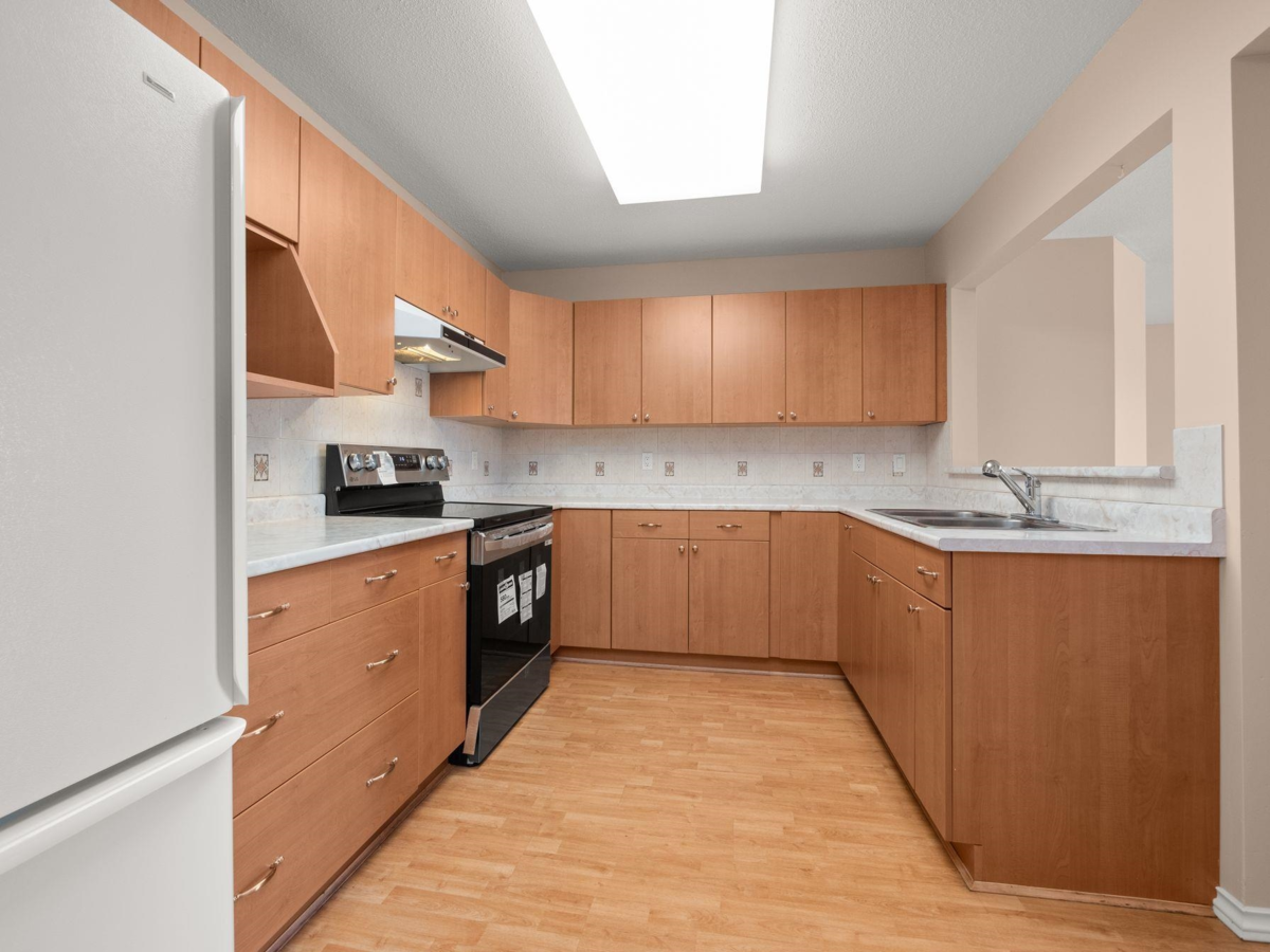 Family Room Photo of 204 1140 55 Street, Delta, BC