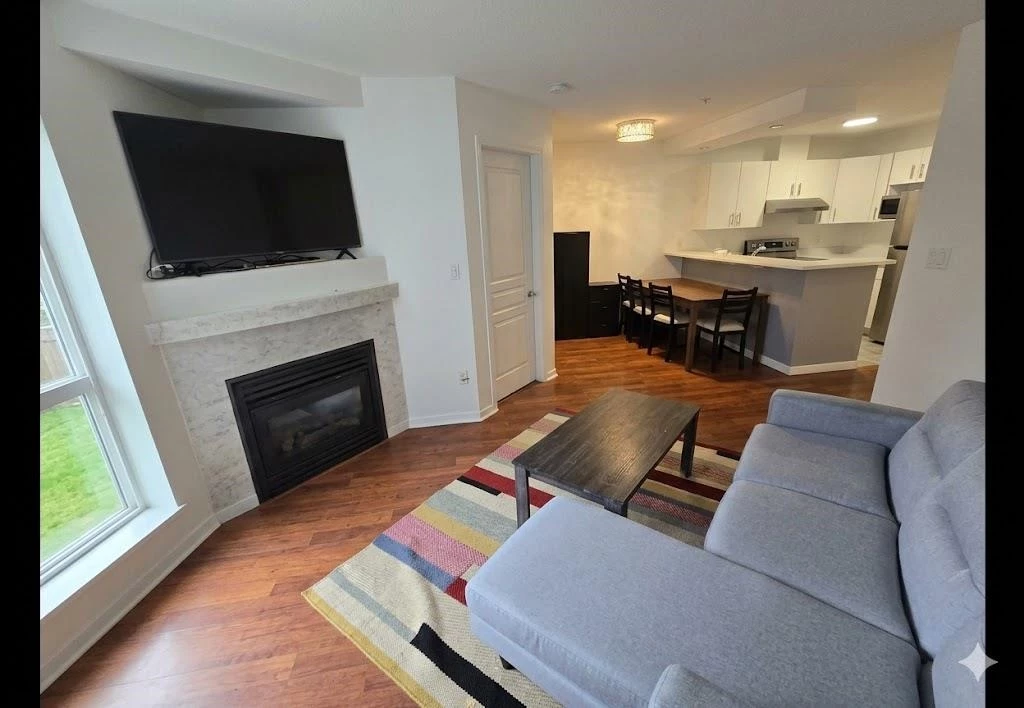 Living Room Photo of 310 20200 56 Avenue, Langley, BC