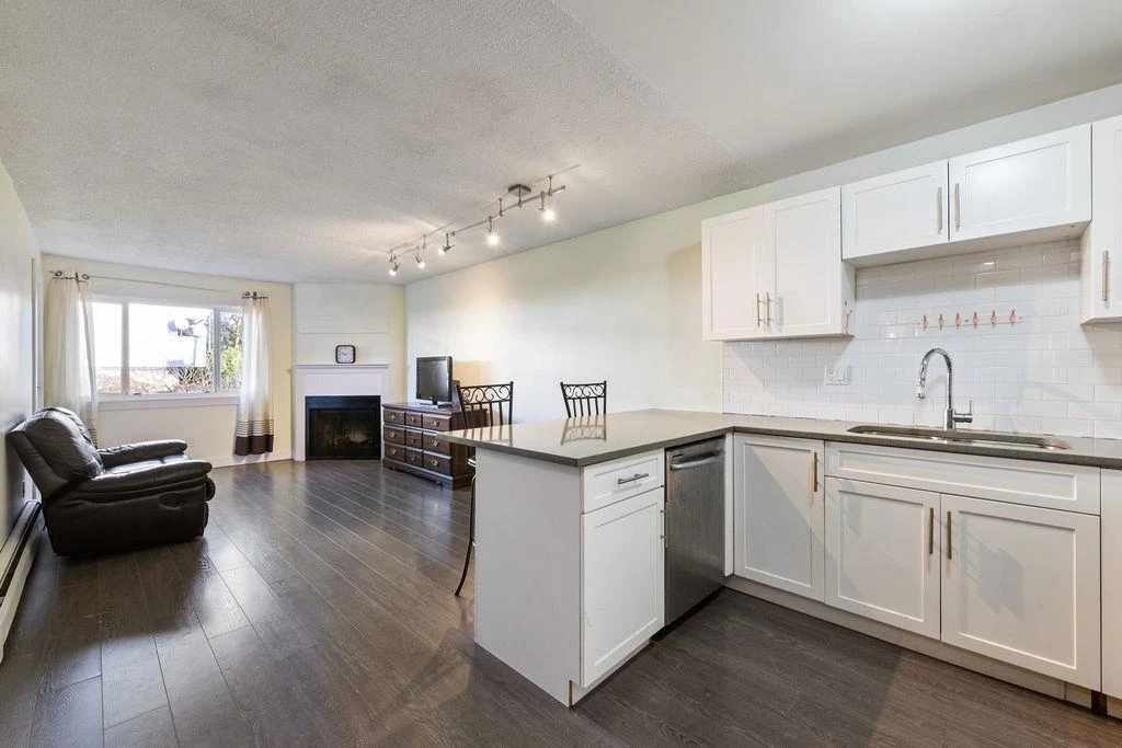 Family Room Photo of 204 1209 Howie Avenue, Coquitlam, BC