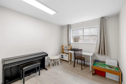 Basement Recreation Room Photo of 206 3668 Rae Avenue, Vancouver, BC