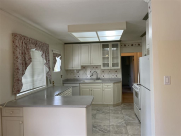 Kitchen Island Photo of 12677 98 Avenue, Surrey, BC