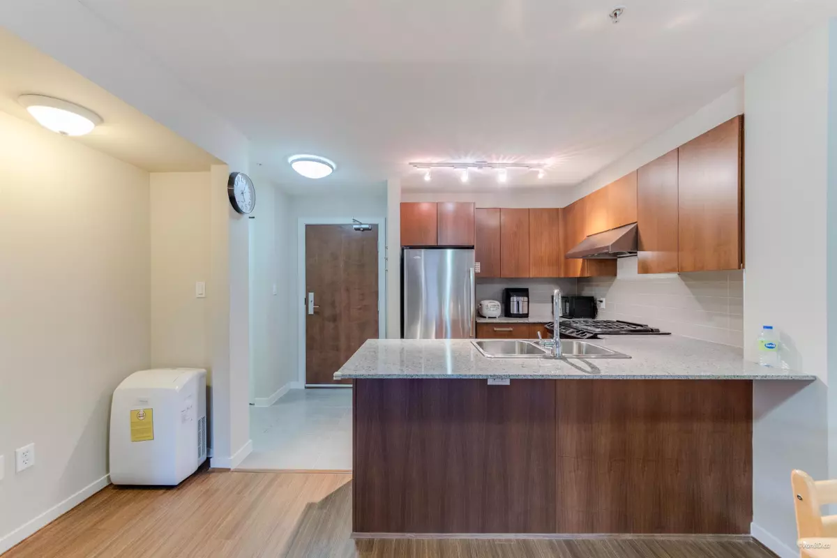 Dining Area Photo of 318 5775 Irmin Street, Burnaby, BC