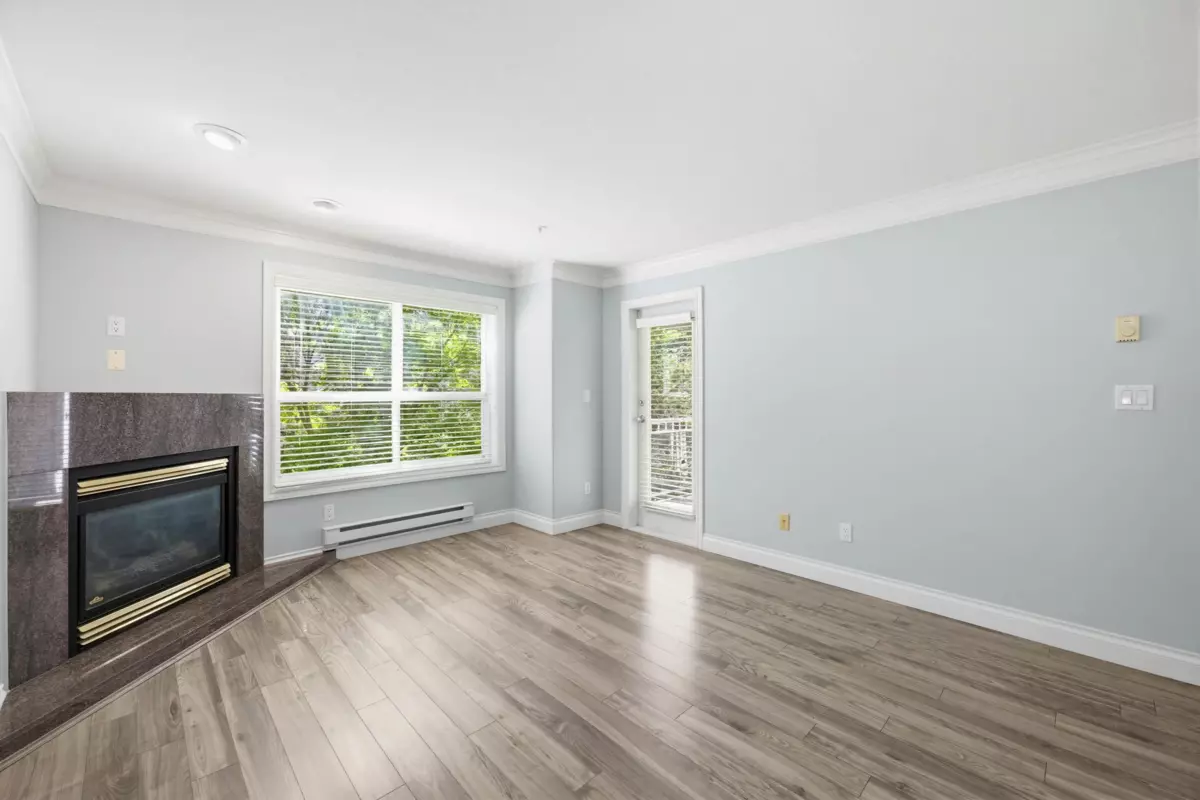 Living Room Photo of 202 8115 121a Street, Surrey, BC
