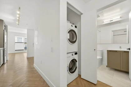 Laundry Room Photo of 504 9228 Slopes Mews, Burnaby, BC