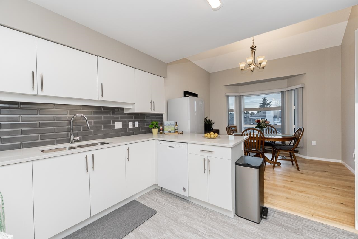 Kitchen Island Photo of 302 13911 70 Avenue, Surrey, BC