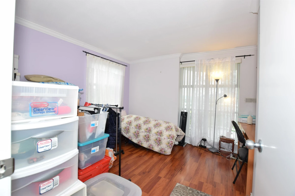 Bedroom 2 Photo of 1105 1180 Pinetree Way, Coquitlam, BC