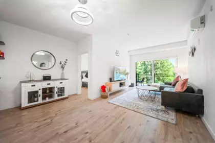 Living Room Photo of 204 3182 Gladwin Road, Abbotsford, BC