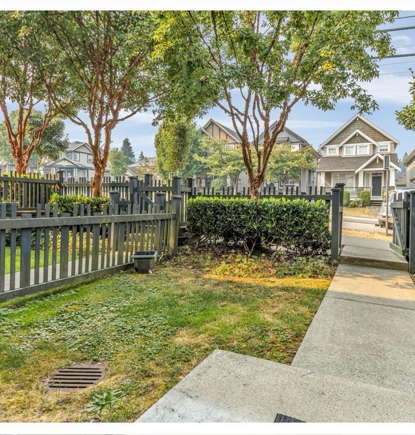 Living Room Photo of 107 14833 61 Avenue, Surrey, BC
