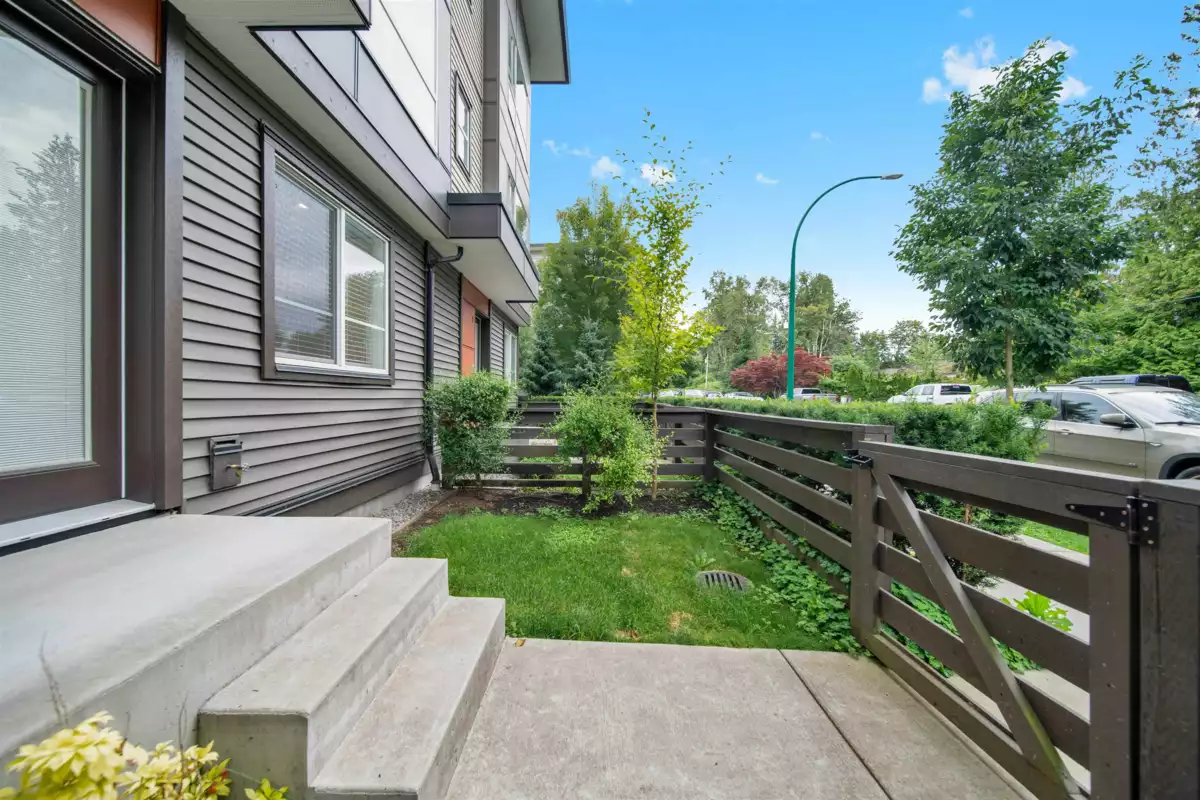 Living Room Photo of 2 7288 188 Street, Surrey, BC