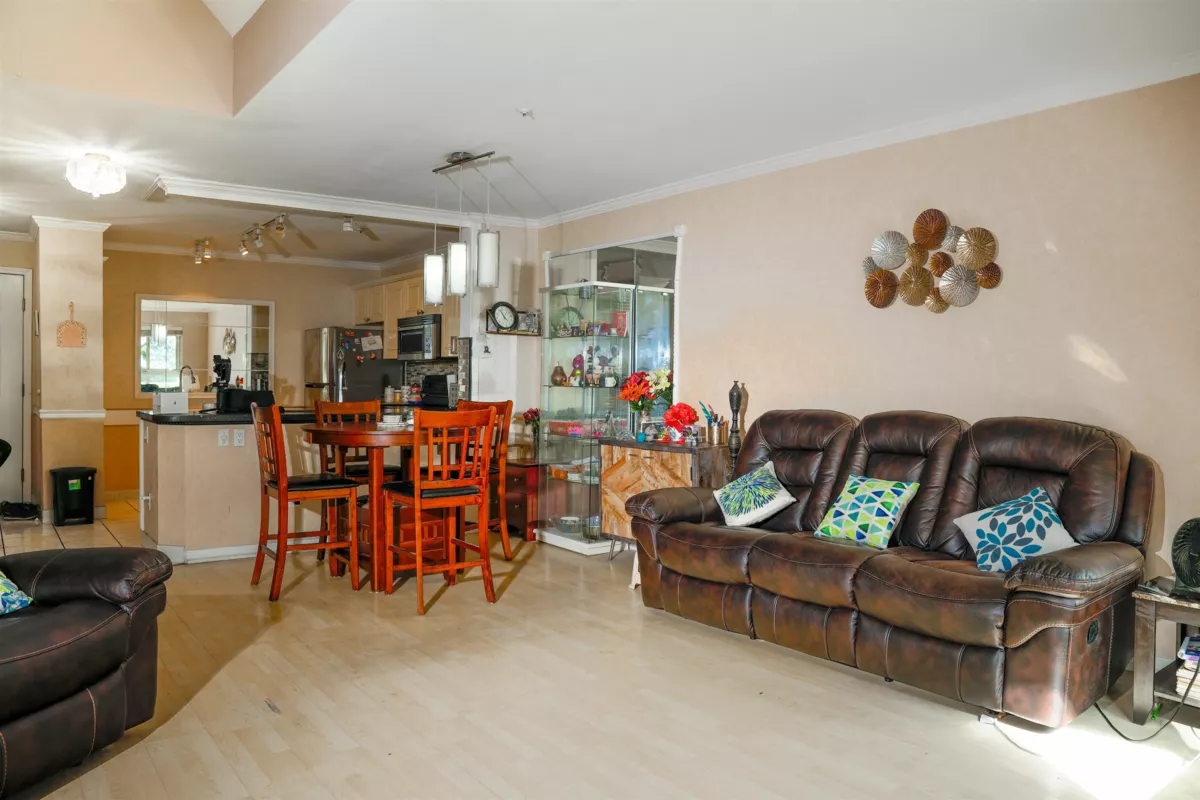 Living Room Photo of 410 7435 121a Street, Surrey, BC