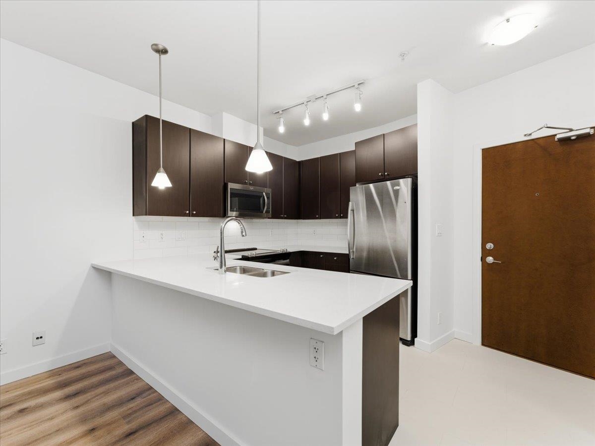 Family Room Photo of 103 225 Francis Way, New Westminster, BC