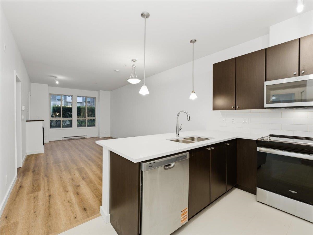 Living Room Photo of 103 225 Francis Way, New Westminster, BC