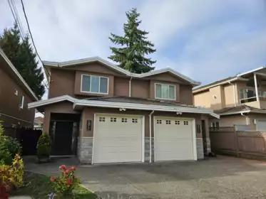 Front exterior of 6973 Dunblane Avenue, Burnaby, BC