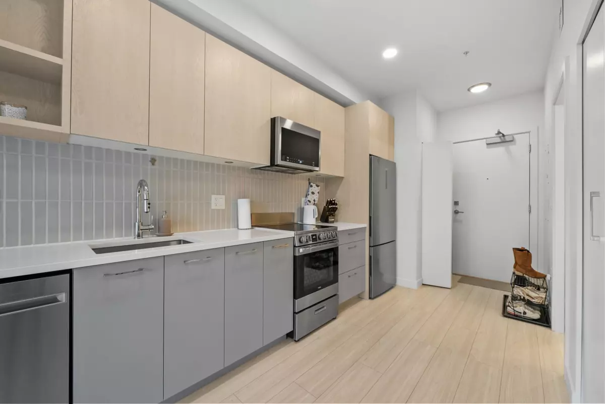 Living Room Photo of 211 10777 138 Street, Surrey, BC