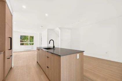 Family Room Photo of 103 934 Lytton Street, North Vancouver, BC