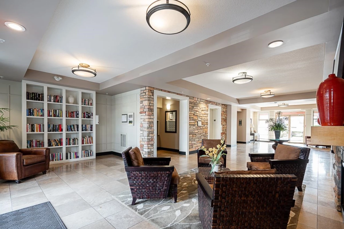 Family Room Photo of 306 16469 64 Avenue, Surrey, BC