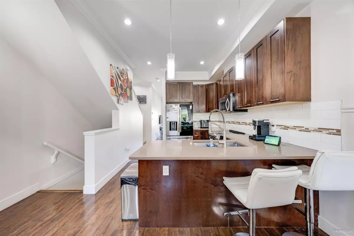 Family Room Photo of 65 6945 185 Street, Surrey, BC