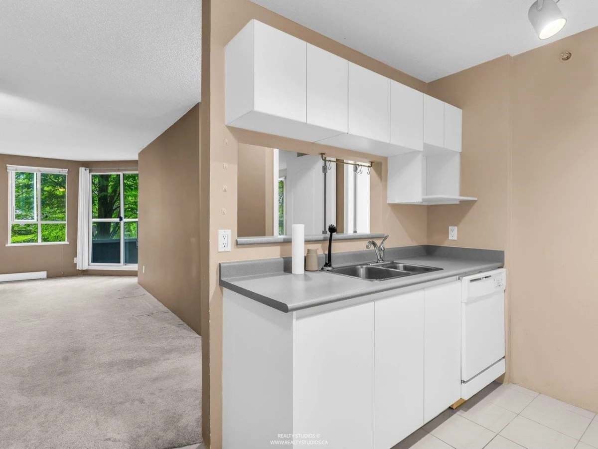 Family Room Photo of 206 3489 Ascot Place, Vancouver, BC