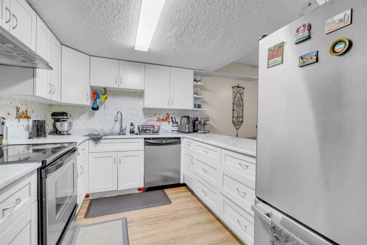 Bedroom 3 Photo of 102 7150 133 Street, Surrey, BC