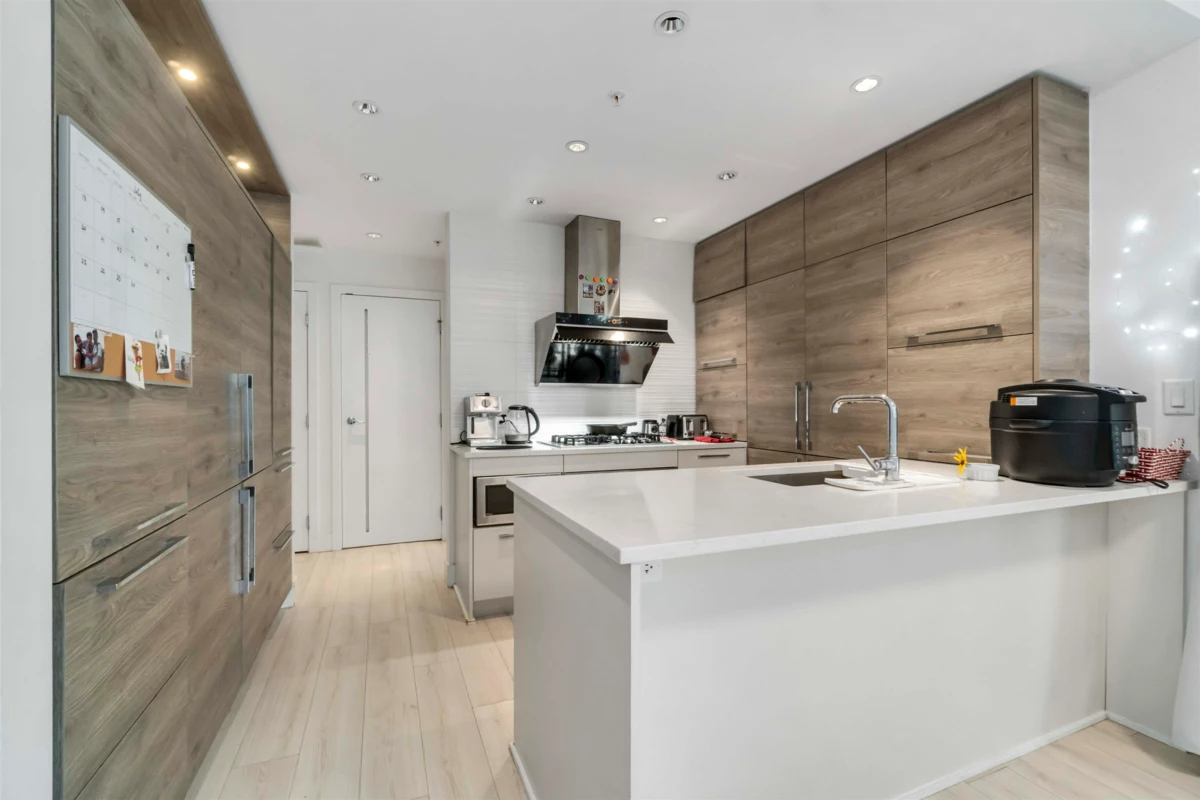 Laundry Room Photo of 402 7388 Kingsway, Burnaby, BC