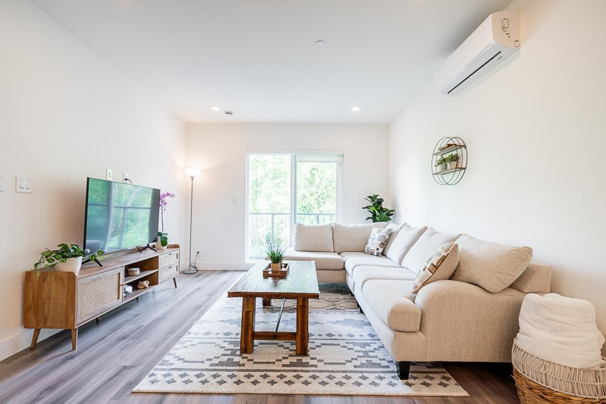 Living Room Photo of B311 8447 202 Street, Langley, BC