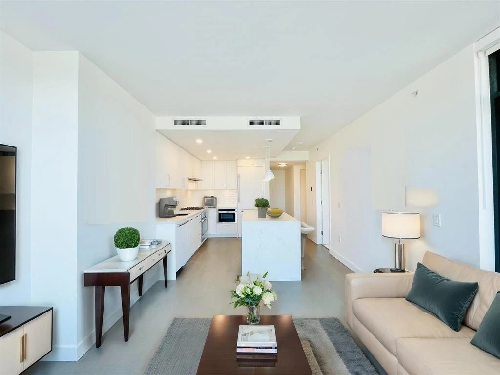 Living Room Photo of 303 1588 Johnston Road, White Rock, BC