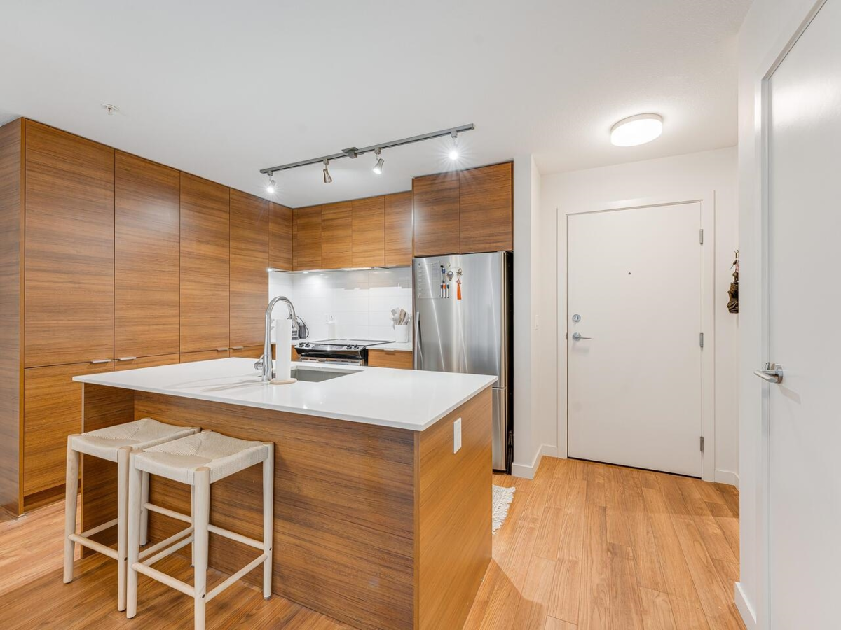 Family Room Photo of 313 1677 Lloyd Avenue, North Vancouver, BC