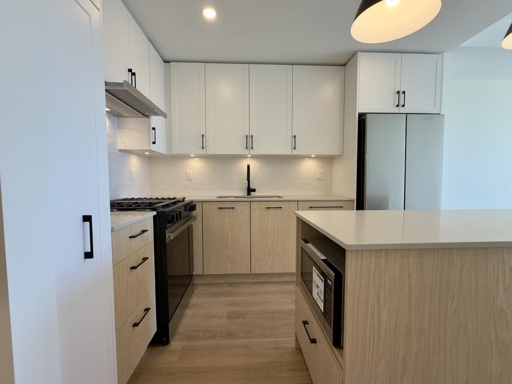 Kitchen Island Photo of 314 27218 Aldergrove Town Centre Drive, Langley, BC