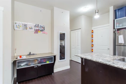 Family Room Photo of 409 9655 King George Boulevard, Surrey, BC