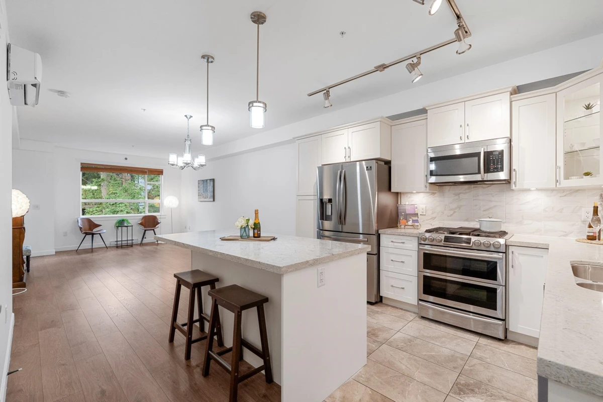 Living Room Photo of 404 14588 Mcdougall Drive, Surrey, BC