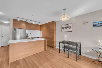 Family Room Photo of 401 1677 Lloyd Avenue, North Vancouver, BC