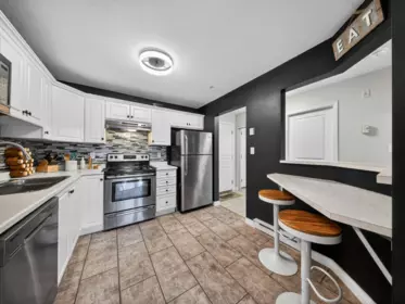 Kitchen Island Photo of 211 33480 George Ferguson Way, Abbotsford, BC