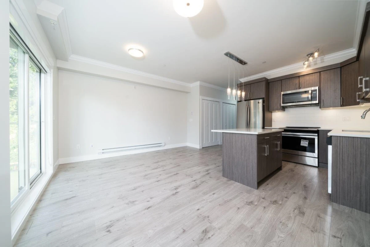 Living Room Photo of 408 13799 101 Avenue, Surrey, BC