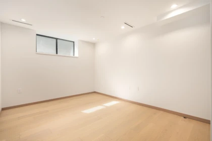 Basement Recreation Room Photo of 2 1448 E 30th Avenue, Vancouver, BC