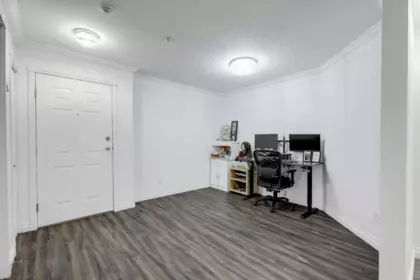 Living Room Photo of 103 12125 75a Avenue, Surrey, BC