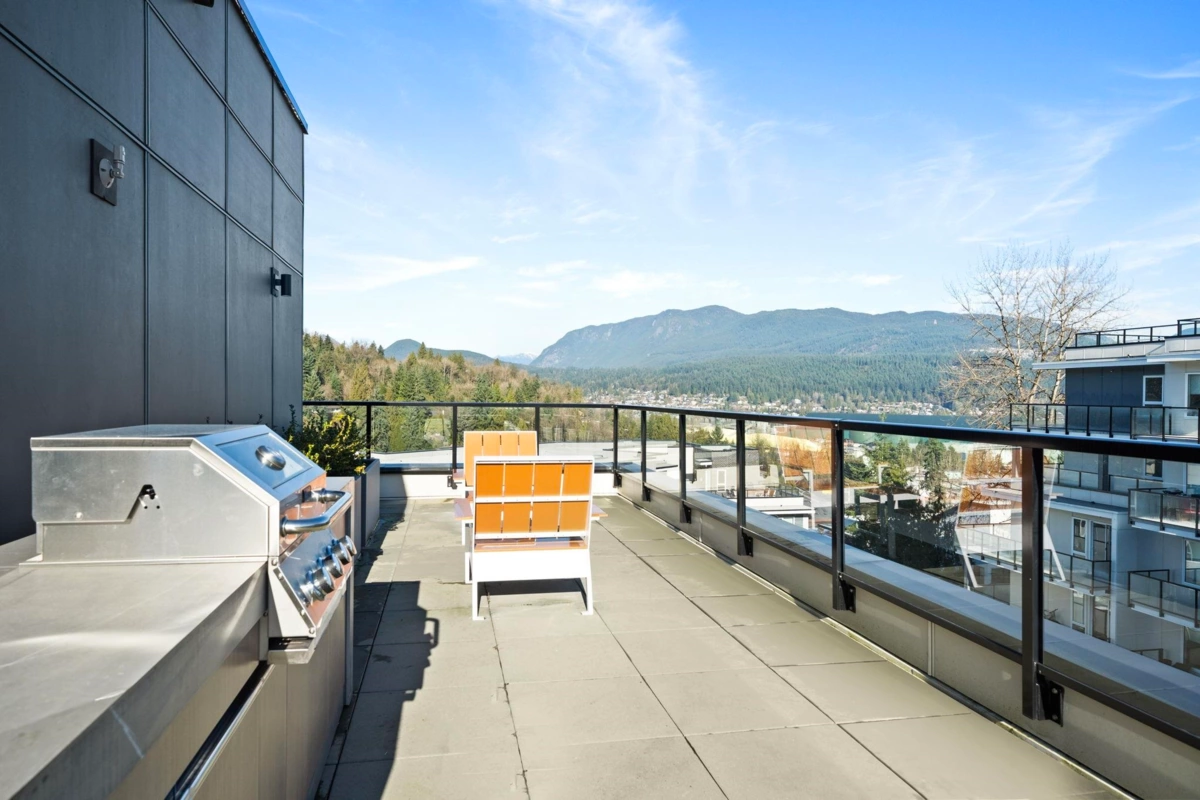 Basement Recreation Room Photo of 103 2002 St. George Street, Port Moody, BC