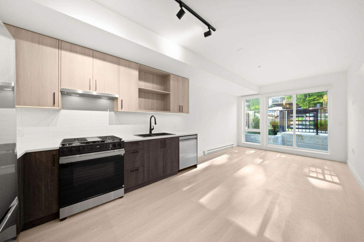 Living Room Photo of 103 2002 St. George Street, Port Moody, BC