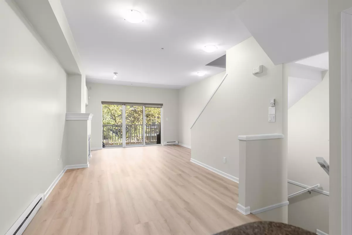 Living Room Photo of 99 935 Ewen Avenue, New Westminster, BC